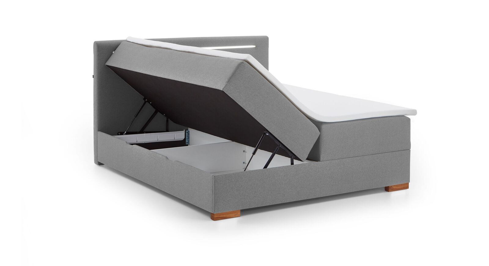 Durch die Zweiteilung von Matratze und Box können bei dem Modell mit 180 cm Breite die Bettkästen von der Seite aus geöffnet werden.