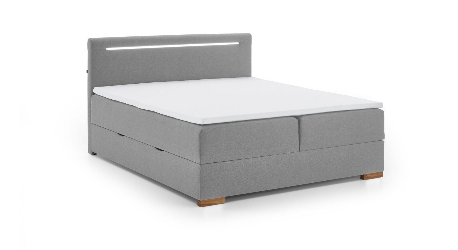 Ab einer Breite von 180 cm sind bei dem Bettkasten-Boxspringbett "Duman" Box und Matratze zweigeteilt.
