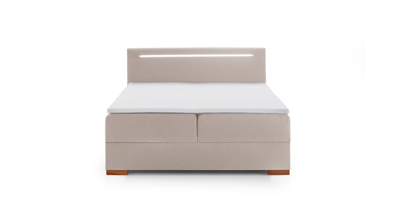 Das kompakte Bettkasten-Boxspringbett "Noar" wird inklusive mittelweicher Federkern-Matratze und Kaltschaum-Topper geliefert.