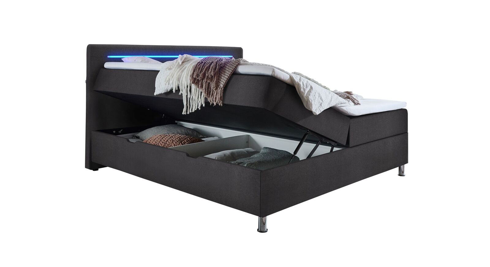 In der Doppelbettgröße 180x200 cm erhalten Sie unter jeder Bettseite einen Bettkasten, den Sie seitlich öffnen können.