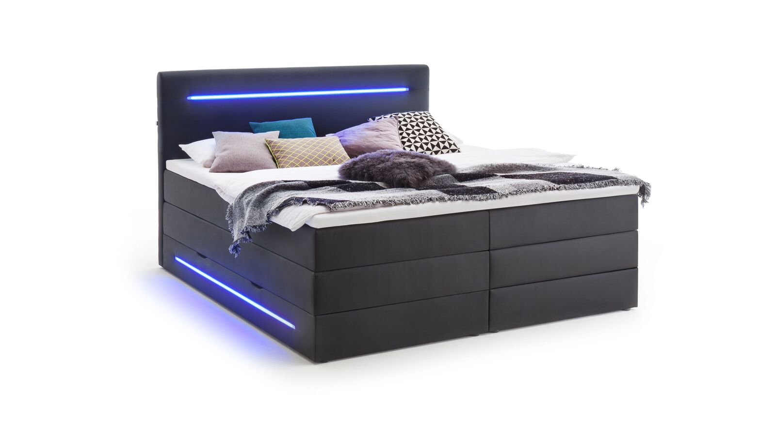 Das außergewöhnliche Boxspringbett "Tollocan" bettet Sie mit einer Liegehöhe von 65 cm (inkl. Matratze und Topper).
