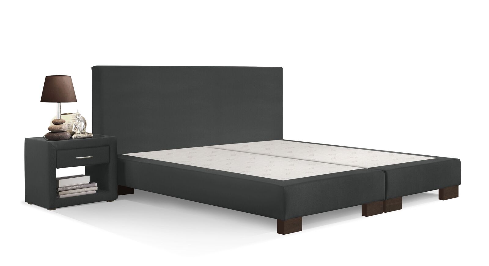 Wengefarbene Füße und ein Bezug in Anthrazit verleihen der Boxspring-Base "Polar" eine stilvolle Optik.