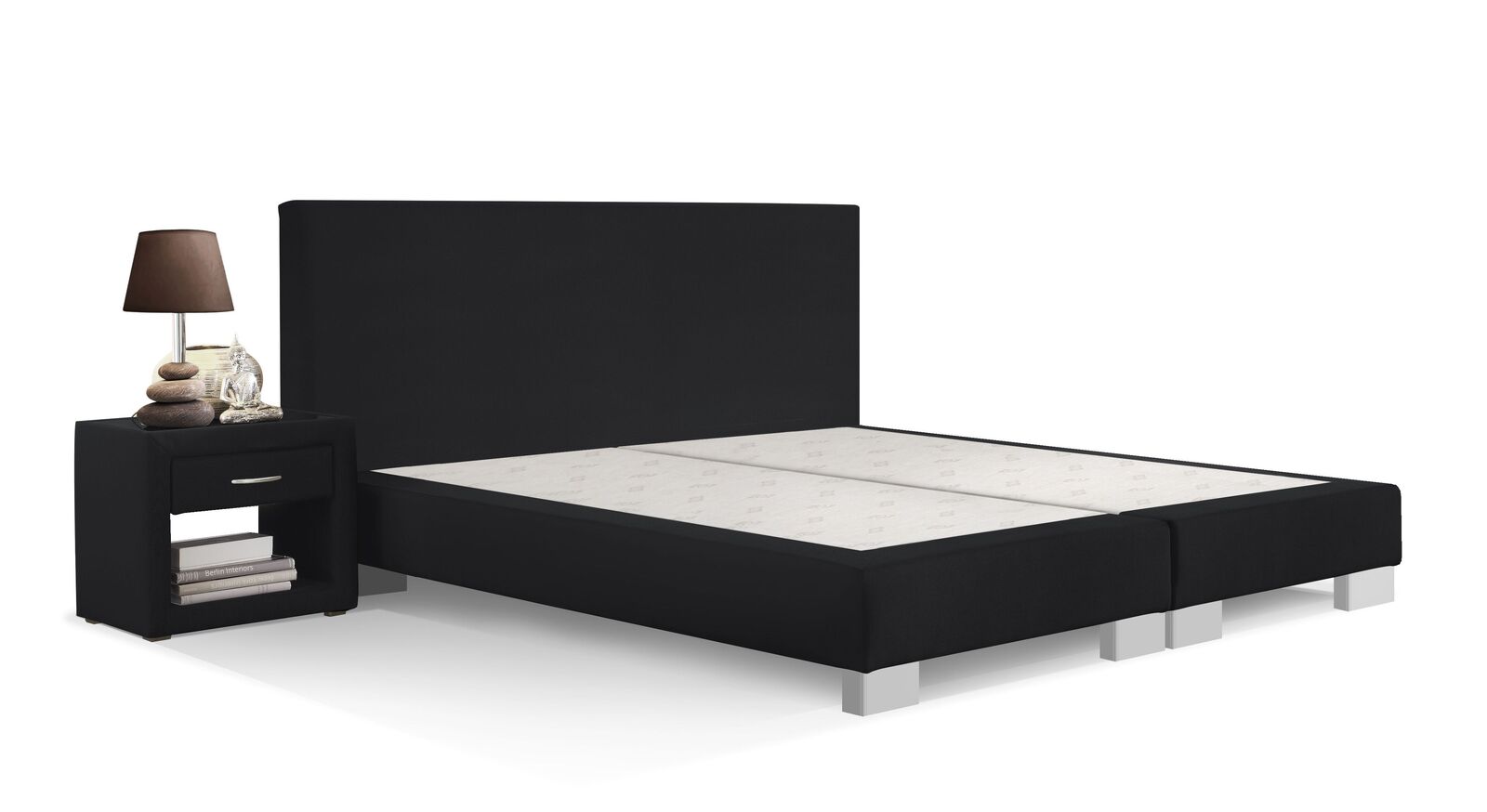 Klassische Eleganz strahlt die Boxspring-Base "Polar" mit schwarzem Bezug und silberfarbenen Füßen aus.