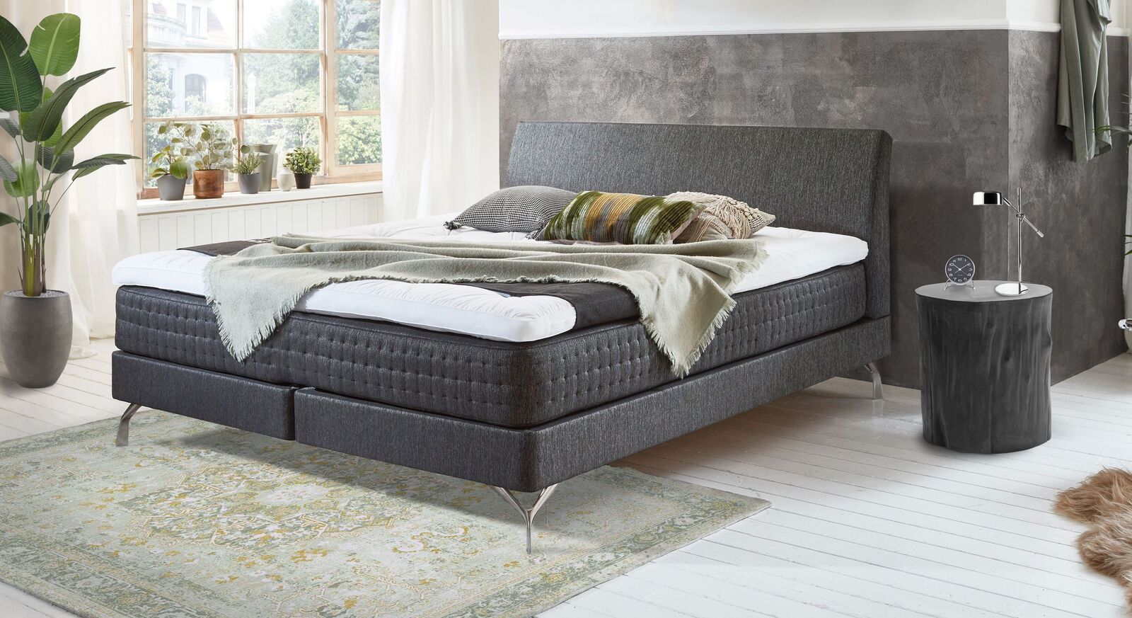 Die Matratze des attraktiven Boxspringbettes "Barima" weiß mit einer aufwändigen Punkt-Steppung zu überzeugen.