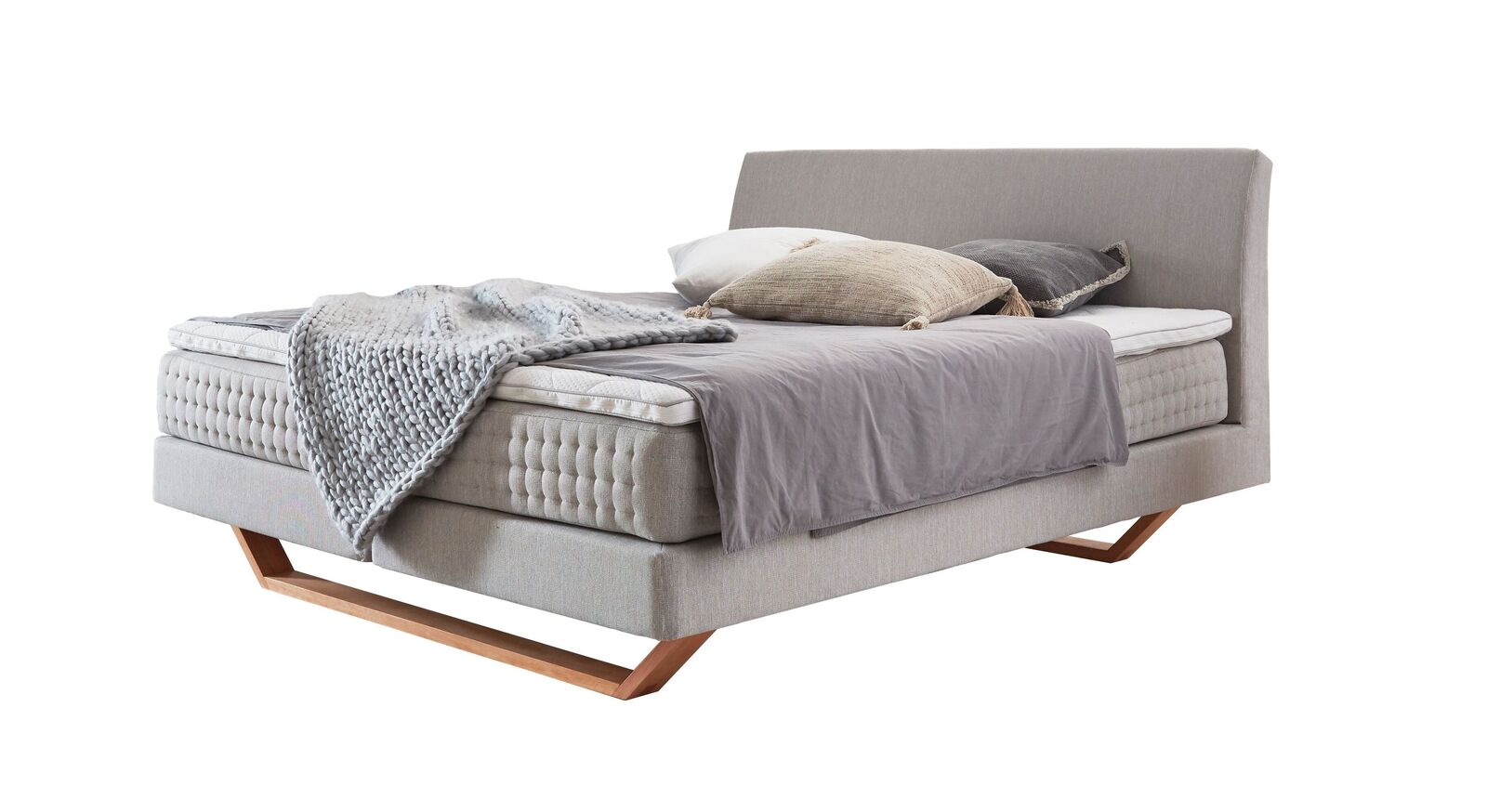 Das Boxspringbett "Clarice" im modernen Material-Mix - hier mit hellgrauem Webstoffbezug.