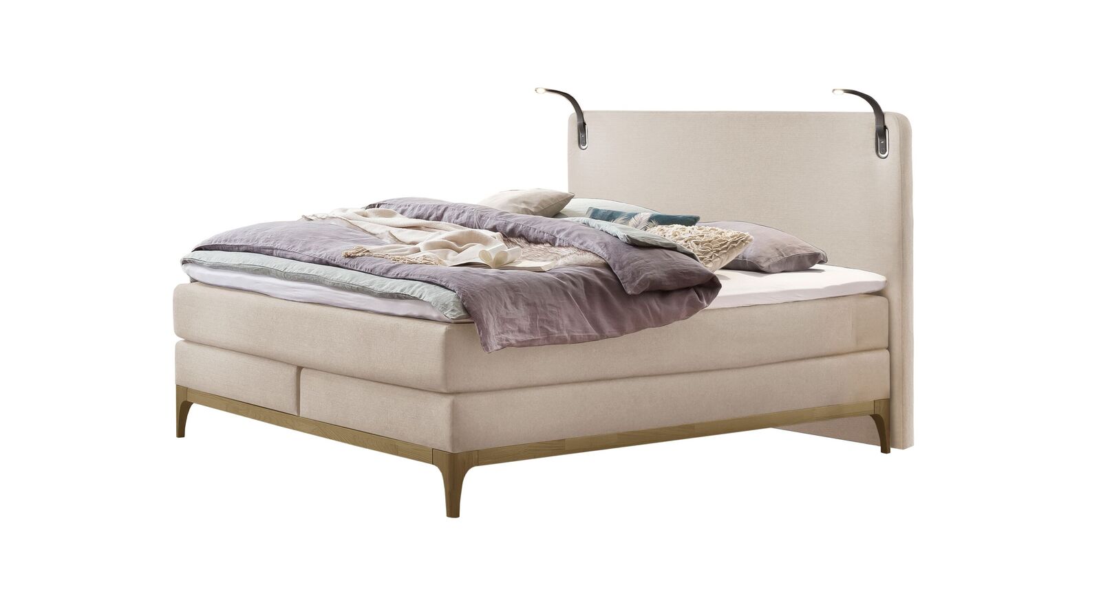 Elegant und gemütlich: das Boxspringbett "Danilo" in Beige.