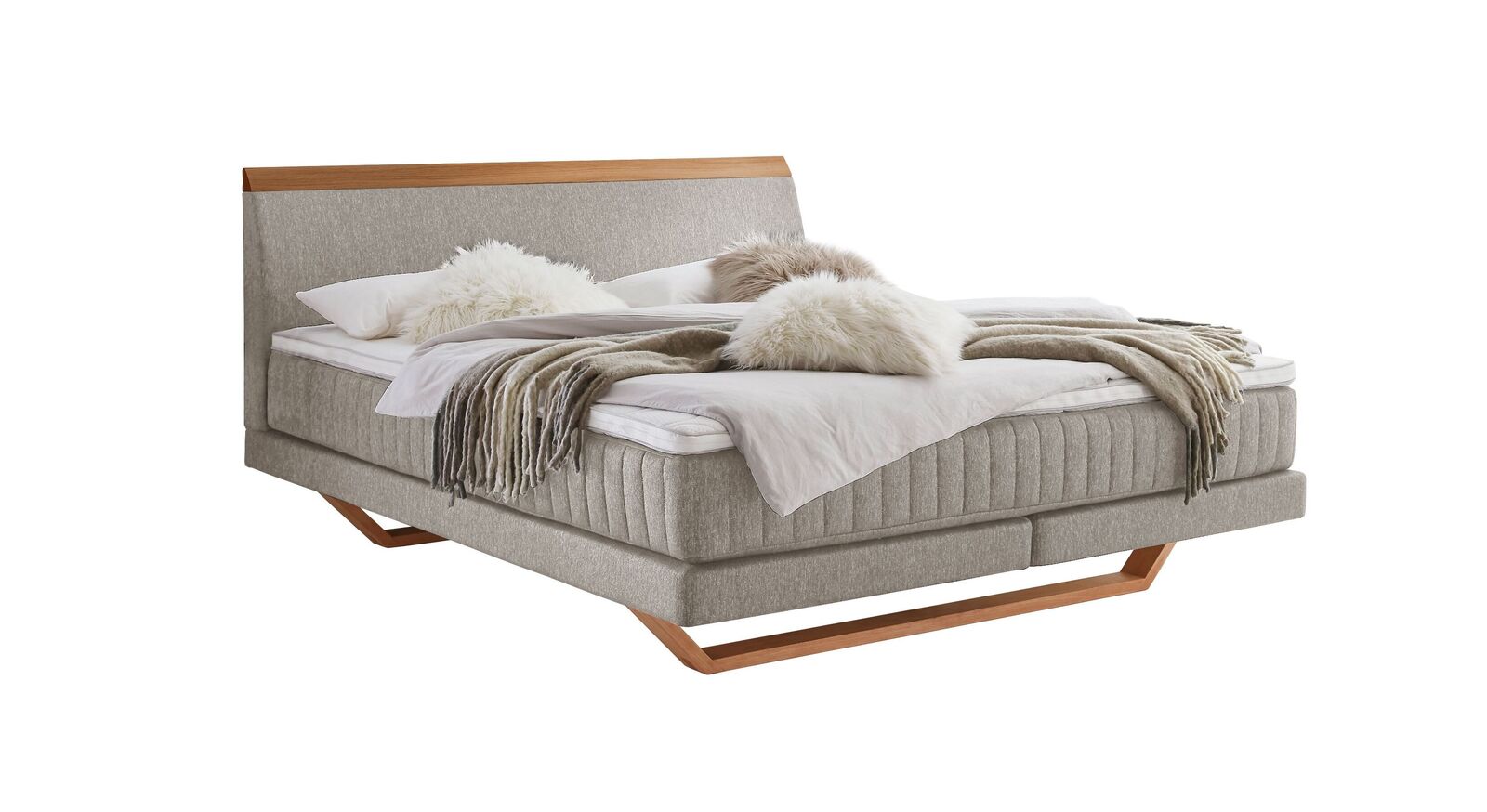 Das moderne Boxspringbett "Imandra" - hier mit cremefarbenem Webstoffbezug.