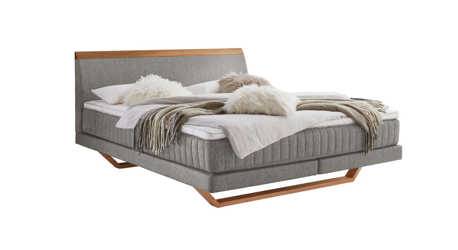 Das moderne Boxspringbett "Imandra" - hier mit hellgrauem Webstoffbezug.