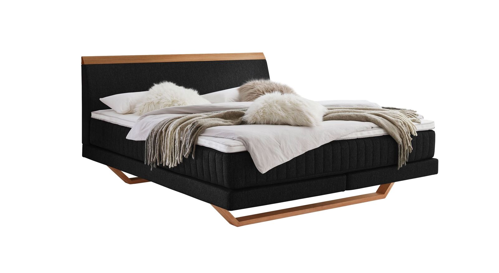 Das moderne Boxspringbett "Imandra" - hier mit schwarzem Webstoffbezug.