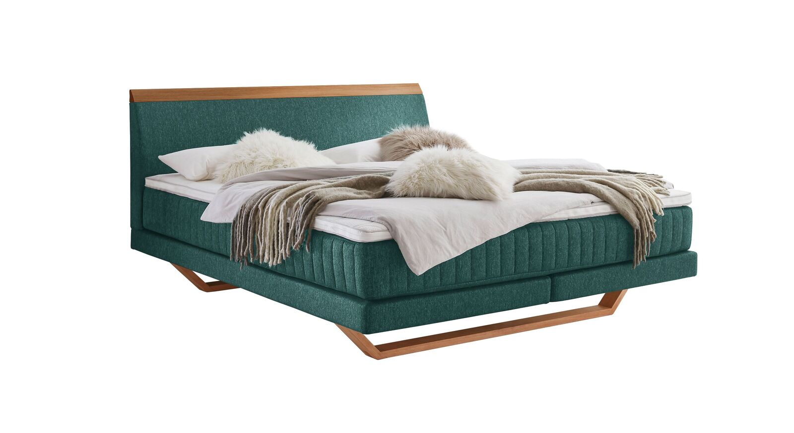 Das moderne Boxspringbett "Imandra" - hier mit türkisfarbenem Webstoffbezug.