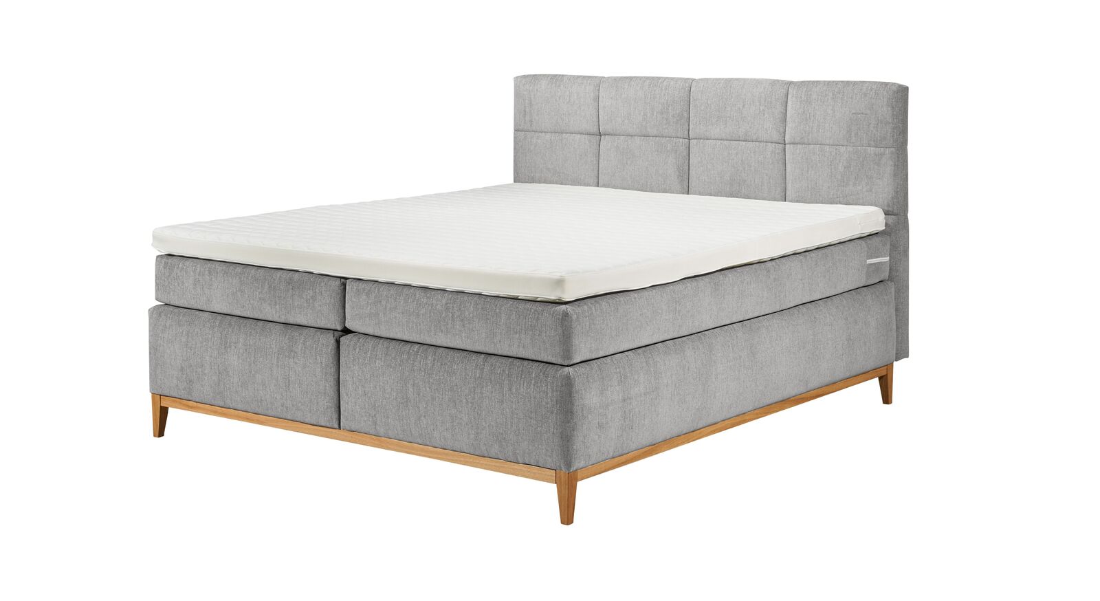 Das Boxspringbett "Jared" wird inklusive mittelfester Matratzen mit Tonnentaschenfederkern und einem Kaltschaum-Topper geliefert.
