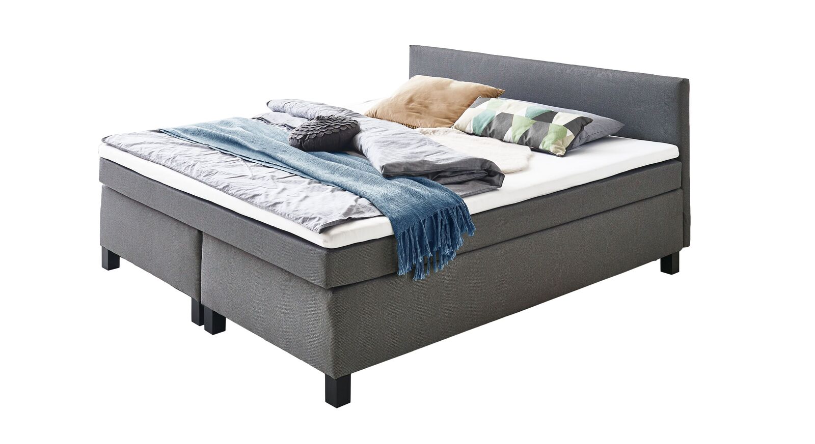 Das Boxspringbett ist in zeitlosem Design gehalten und in verschiedenen Breiten erhältlich.