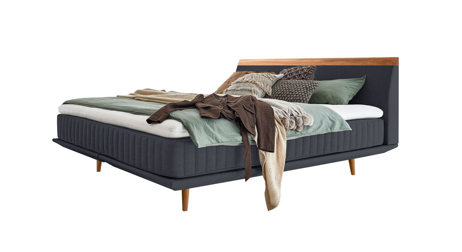Das moderne Boxspringbett "Mavilla" ist in verschiedenen Größen und Farben lieferbar – hier in Petrol.