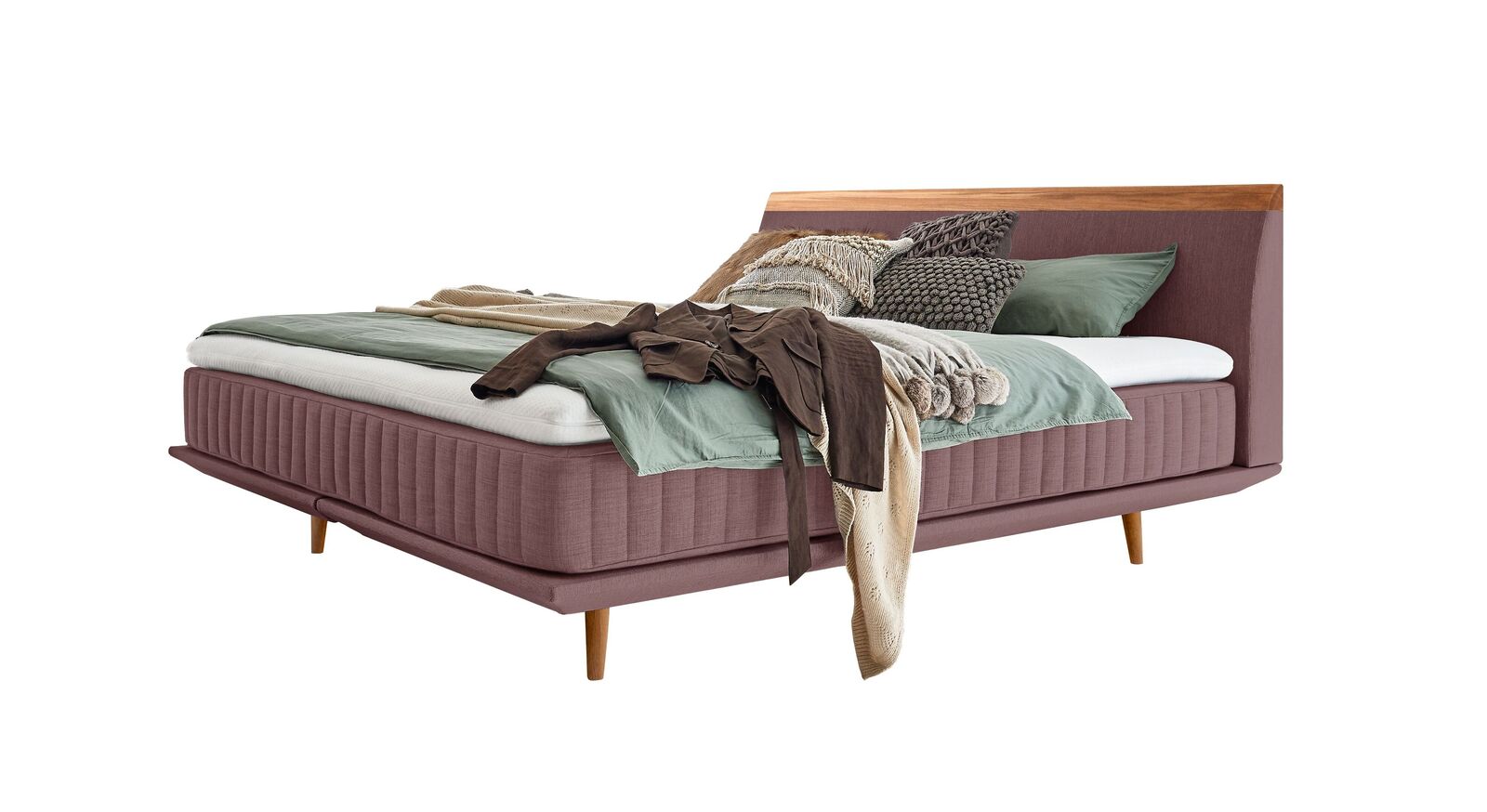 Das moderne Boxspringbett "Mavilla" ist in verschiedenen Größen und Farben lieferbar – hier in Rosa.