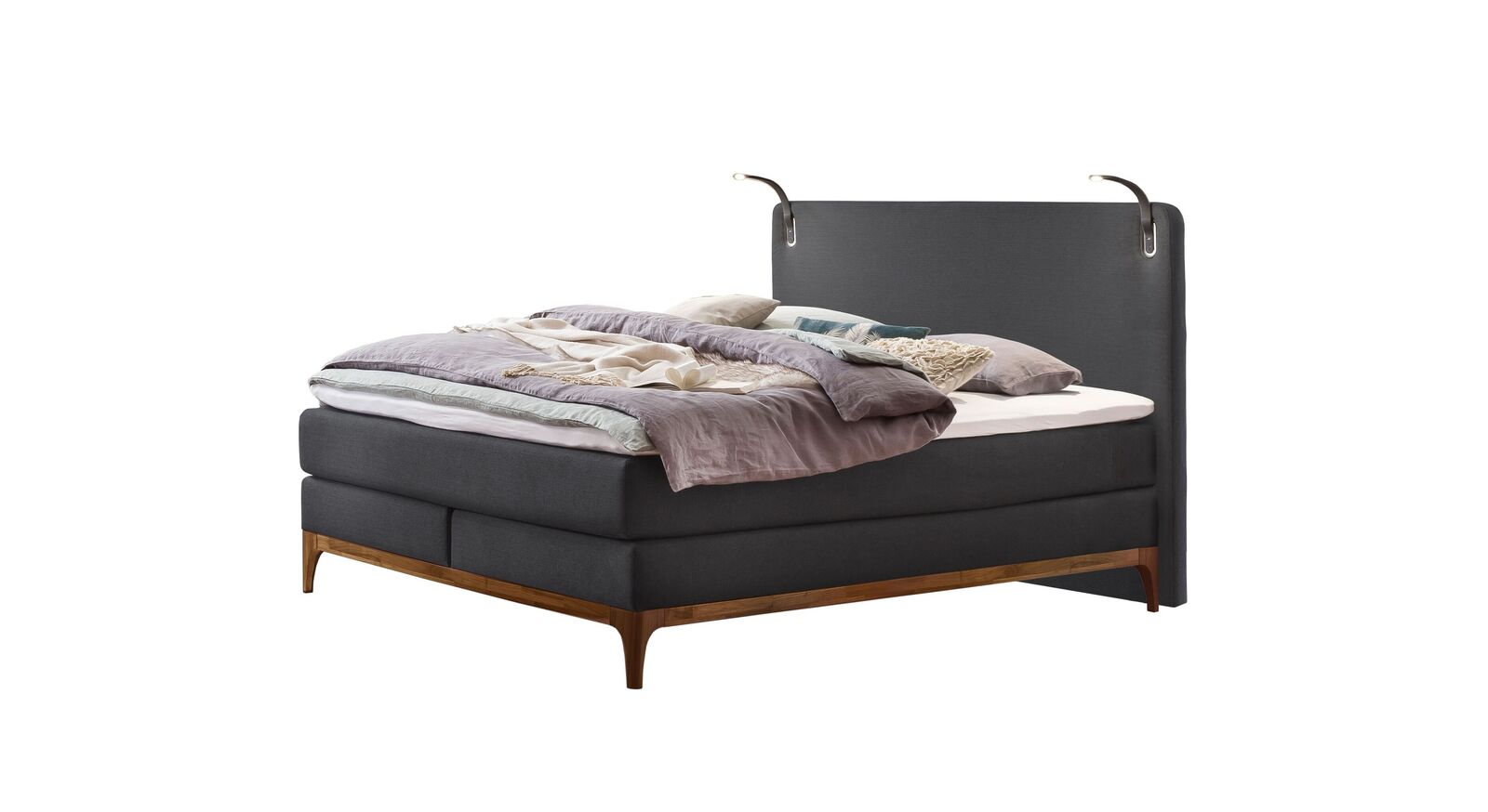 Zeitlos und elegant: das Boxspringbett "Palmiro" mit anthrazitfarbenem Stoffbezug.