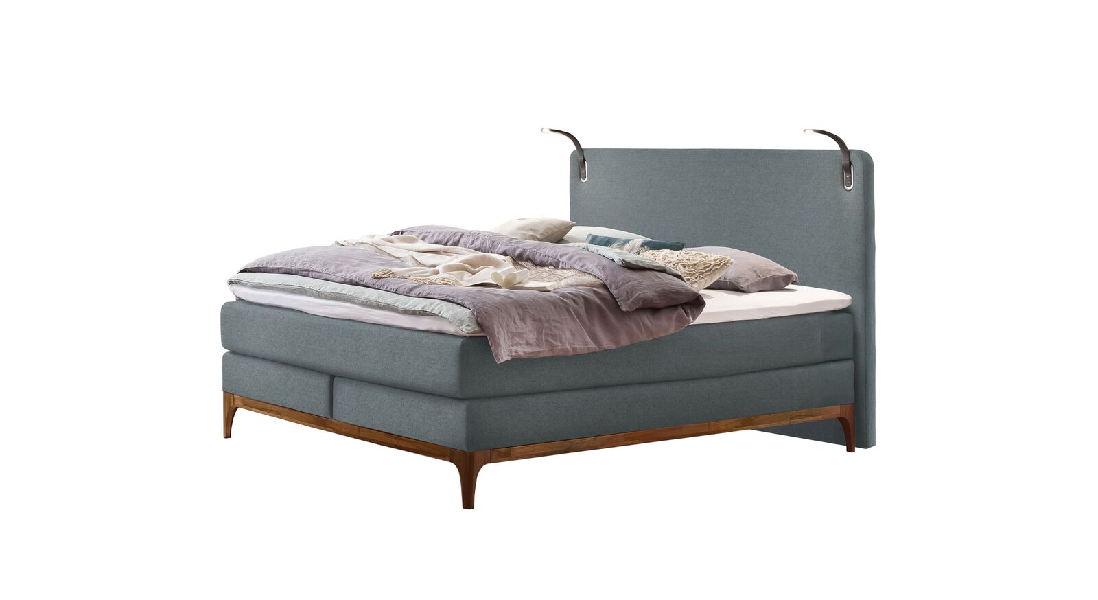 Das Boxspringbett "Palmiro" in der Farbe Blaugrau.