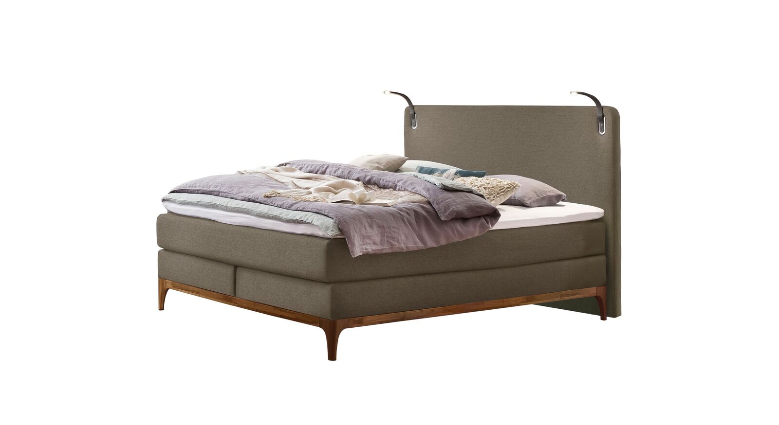 Klassisch und elegant: das Boxspringbett "Palmiro" mit sandgrauem Fischgrät-Velours-Bezug.