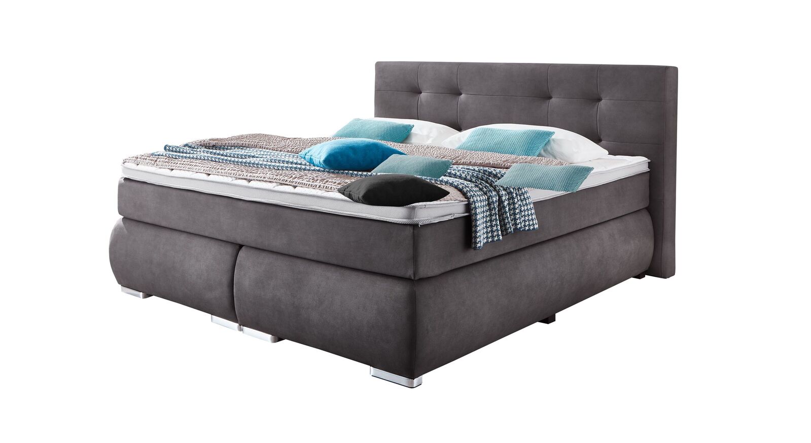 Das elegante Boxspringbett "Revelin" ist mit einer wendbaren Taschenfederkernmatratze und einem Komfortschaum-Topper ausgestattet.