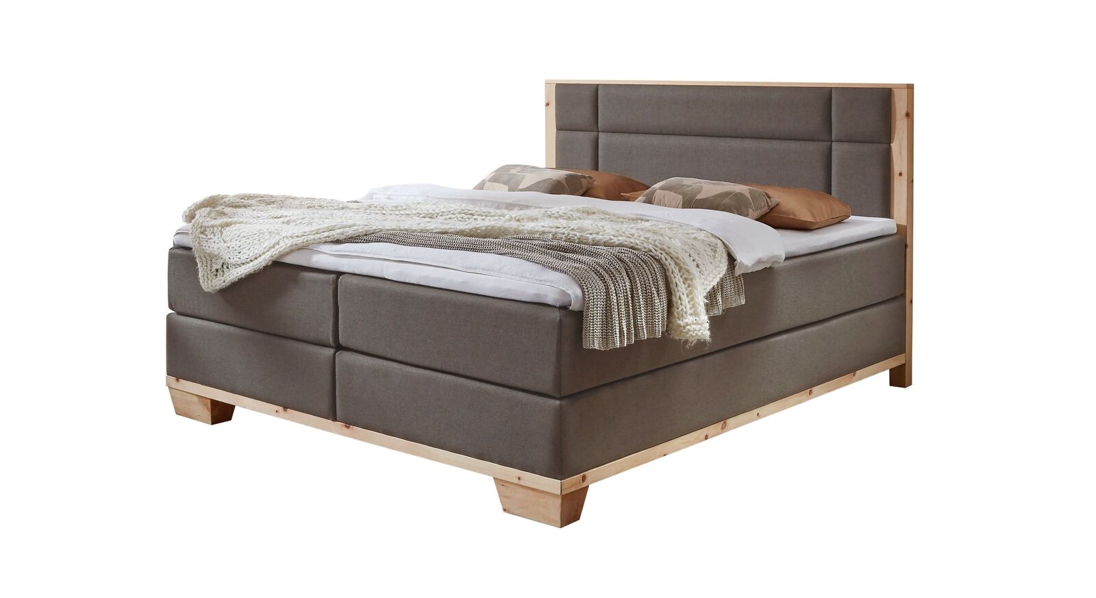 Das attraktive Boxspringbett "Salonetto" im modernen Design - hier mit taupefarbenem Stoffbezug.