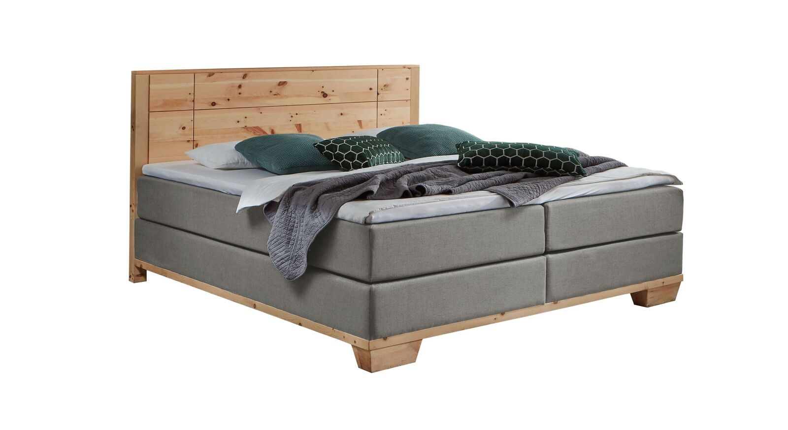 Das markante Boxspringbett "Sinestra" im modernen Materialmix – hier mit hellgrauem Stoffbezug.