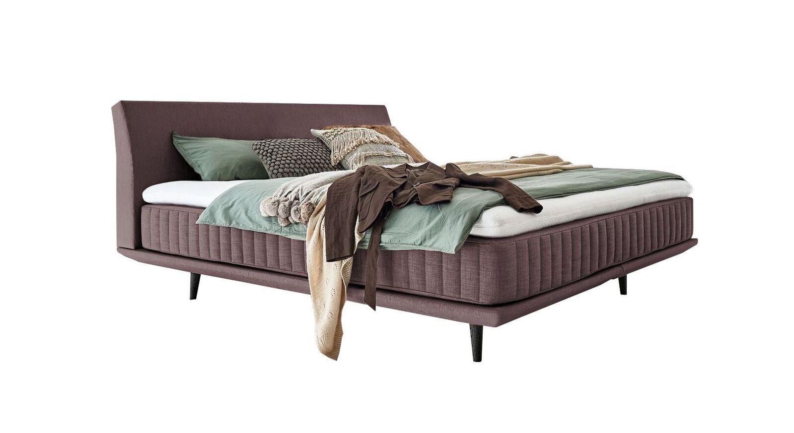 Das elegante Boxspringbett "Valtor" – hier mit einem Webstoffbezug in Rosa.