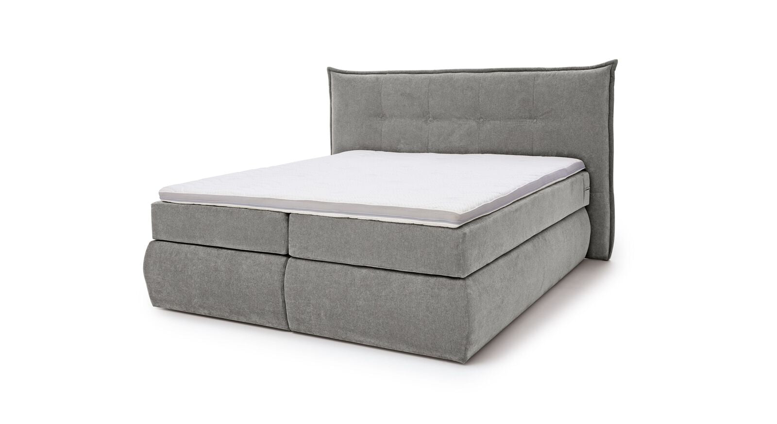 Das MUSTERRING Bettkasten-Boxspringbett "Felina-Case" Fledermaus – hier mit grobem Microfaserbezug in Hellgrau.
