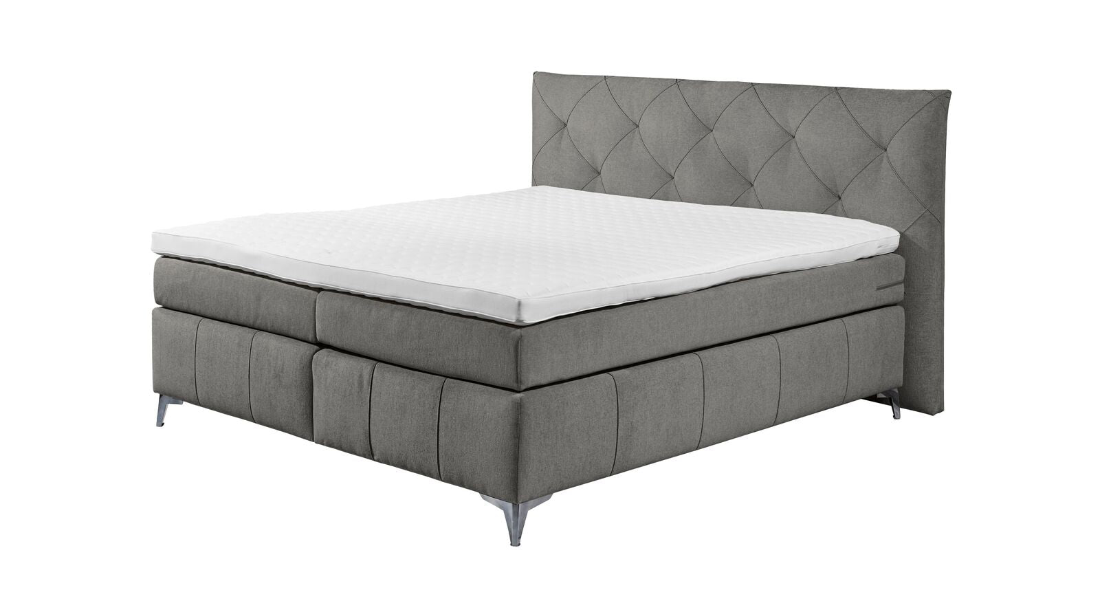 Alles inklusive: Das graue Boxspringbett "Aidan" wird inklusive Box, Matratze und Topper geliefert.
