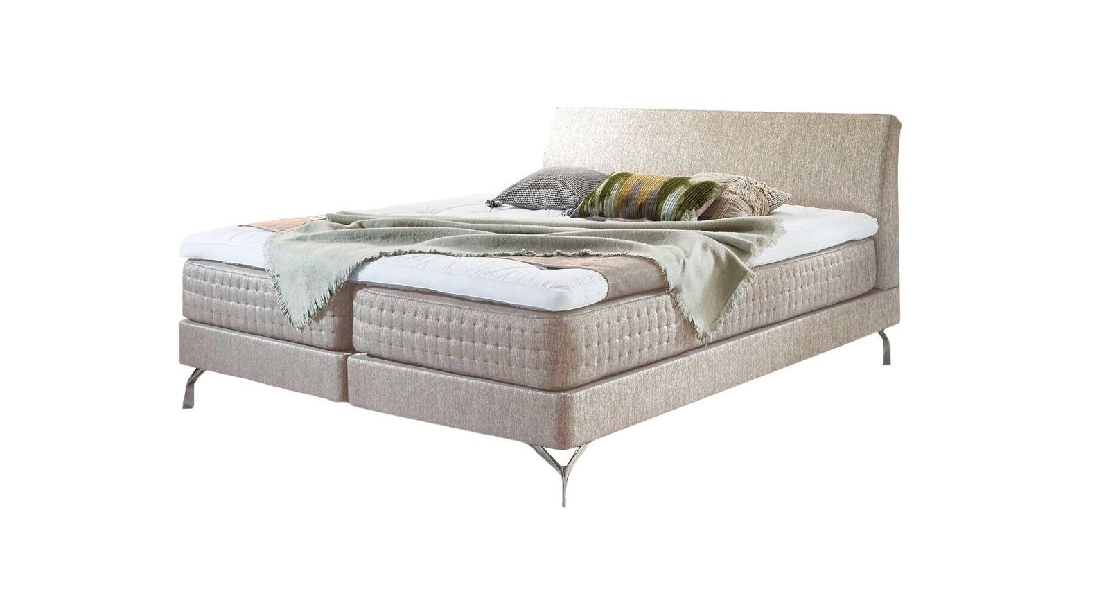 Das Boxspringbett "Barima" in extravagantem Design - hier in der Farbe Creme.