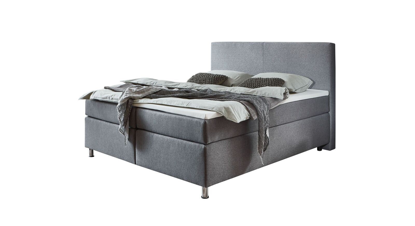 Das 180x200 cm gro&szlig;e HOMELIV. Boxspringbett "Carpo" mit elegantem Stoffbezug &ndash; hier in Hellgrau.