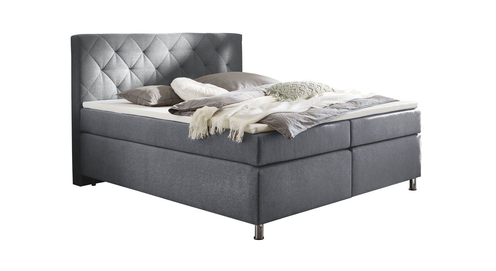 Im Lieferumfang des HOMELIV. Boxspringbettes "Cordelia" (hier in Hellgrau) ist ein Topper mit Kern aus Kaltschaum enthalten.