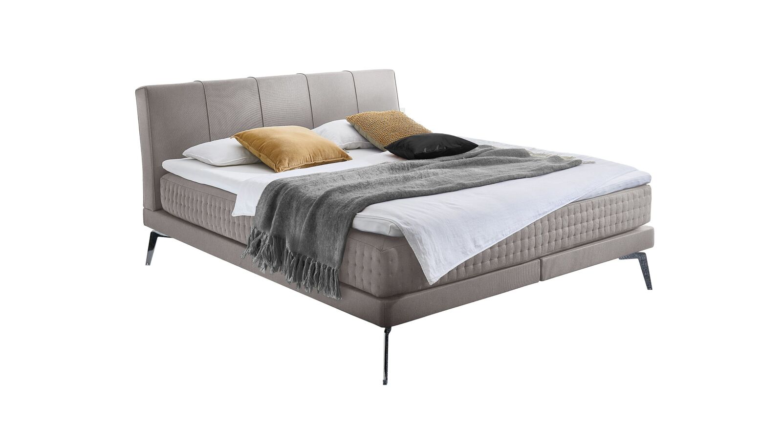 Das Boxspringbett "Elipsa" &ndash; hier mit Stoffbezug in Creme.