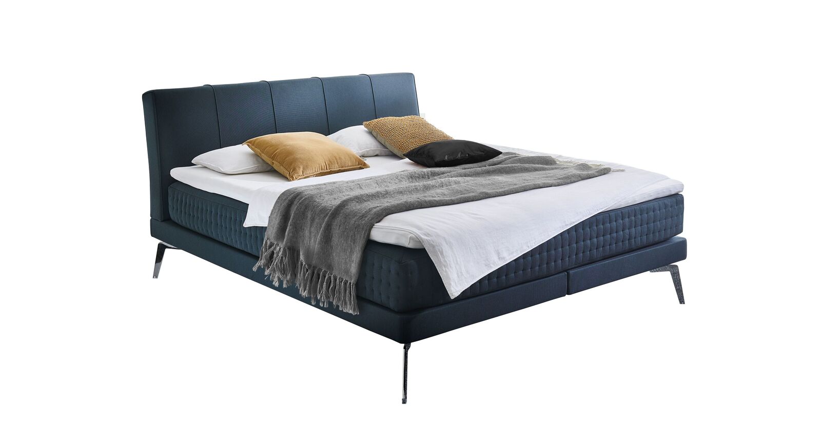 Das Boxspringbett "Elipsa" &ndash; hier mit Stoffbezug in Petrol.