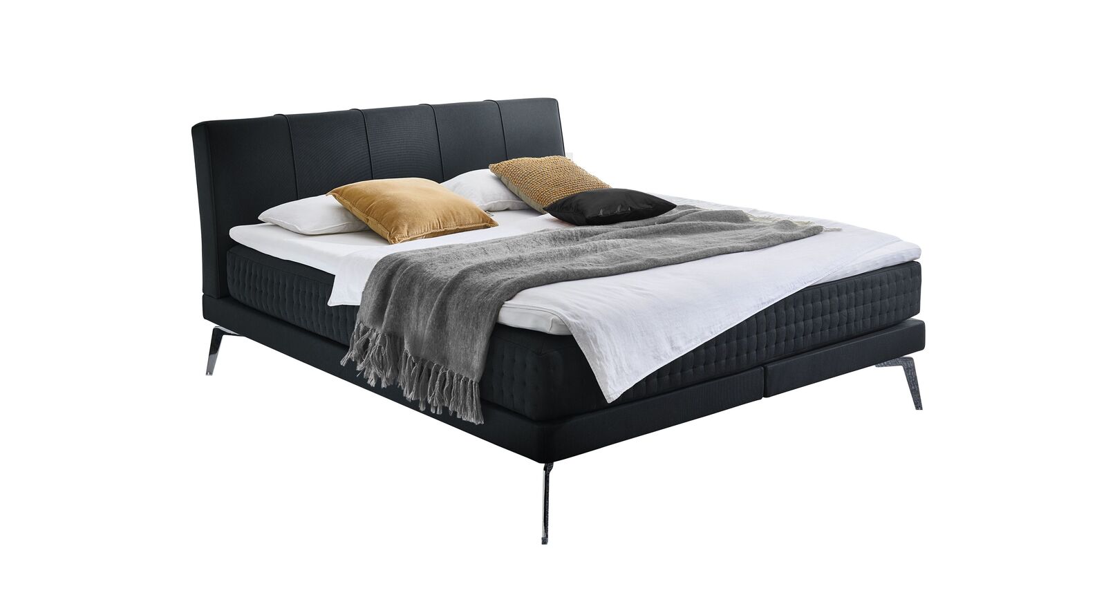 Das Boxspringbett "Elipsa" &ndash; hier mit Stoffbezug in Schwarz.