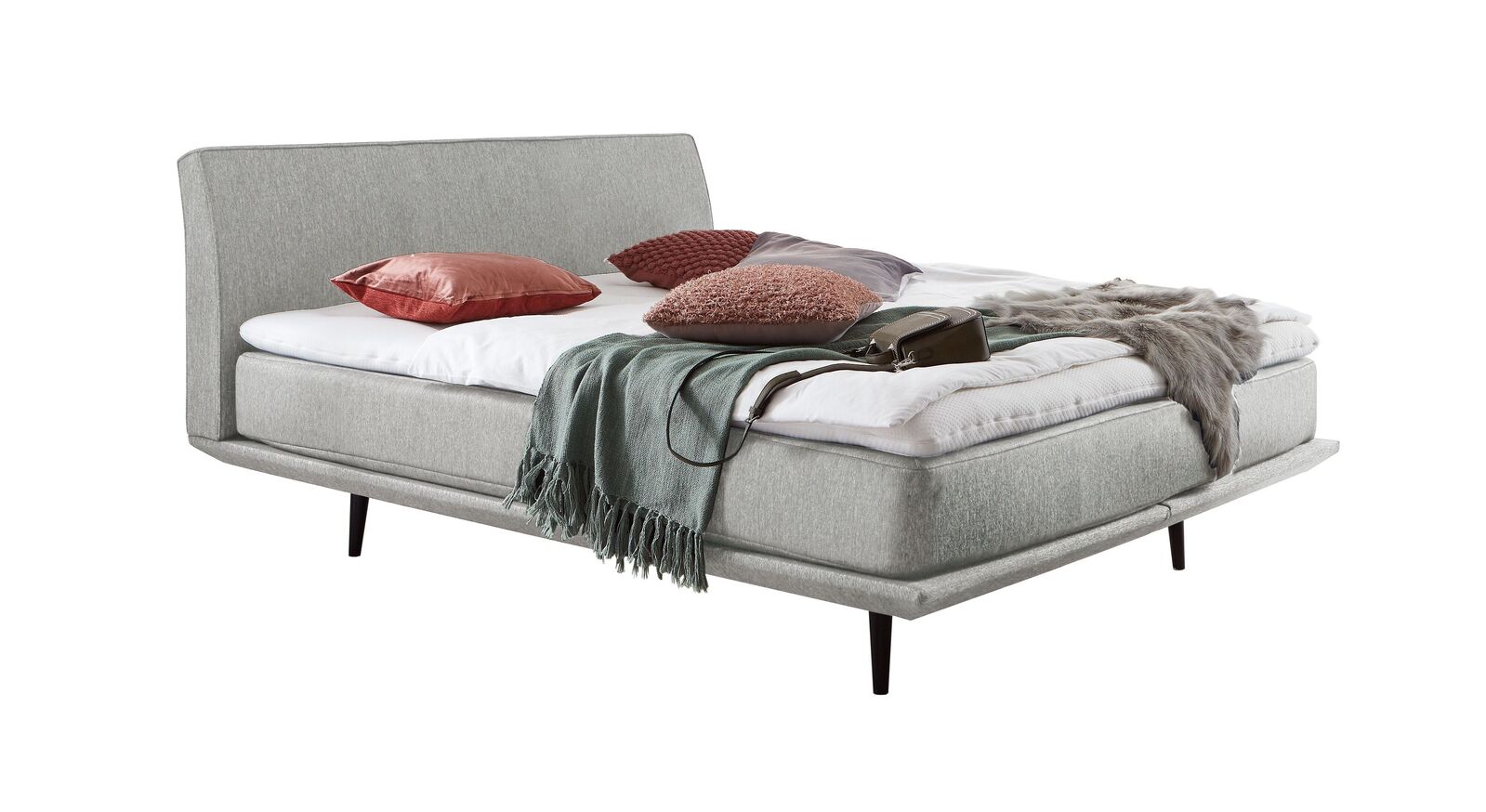 Das moderne Boxspringbett "Erendor" &ndash; hier mit einem Webstoffbezug in Creme.