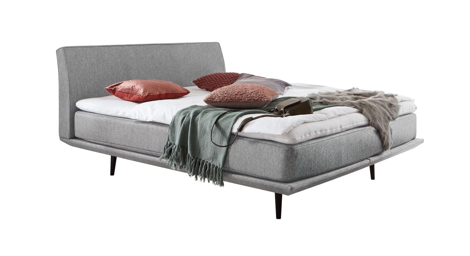 Das moderne Boxspringbett "Erendor" &ndash; hier mit einem Webstoffbezug in Hellgrau.