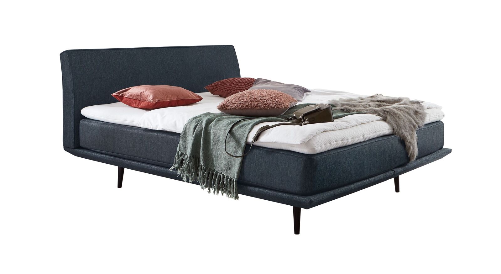 Das moderne Boxspringbett "Erendor" &ndash; hier mit einem Webstoffbezug in Petrol.