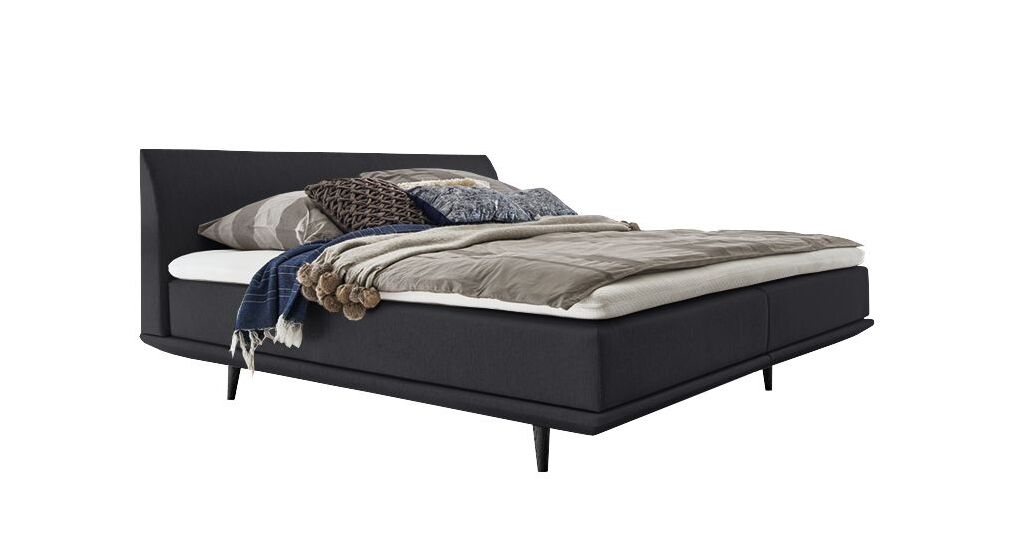 Das geradlinige Boxspringbett "Lajana" im Skandi Look &ndash; hier mit einem Webstoffbezug in Anthrazit.