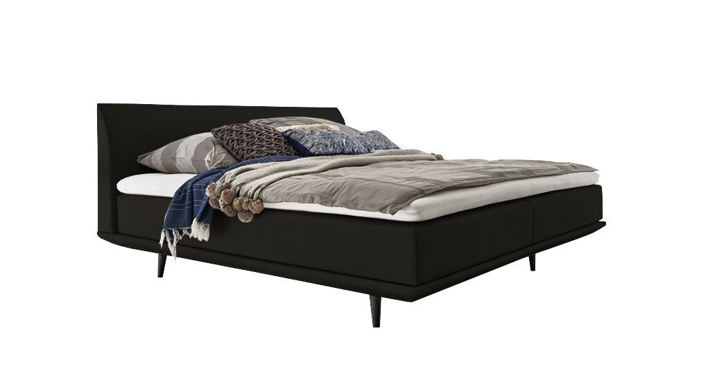 Das geradlinige Boxspringbett "Lajana" im Skandi Look &ndash; hier mit einem Webstoffbezug in Schwarz.