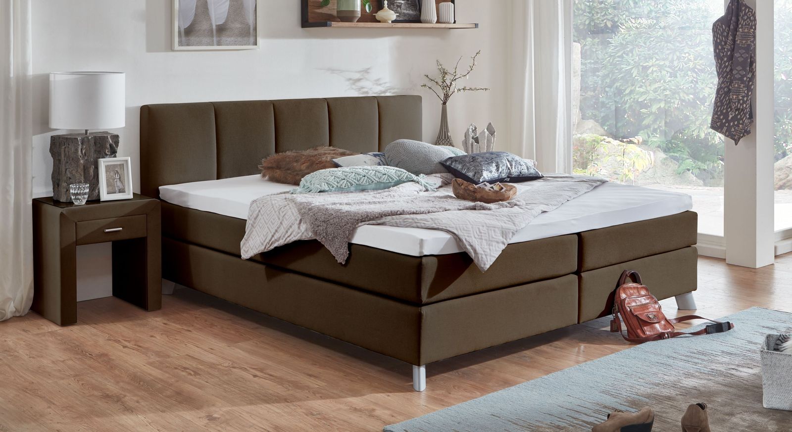 Mit dem Boxspringbett "Ramea" (hier in Braun, 53 cm H&ouml;he) g&ouml;nnen Sie sich exquisiten Liegekomfort.
