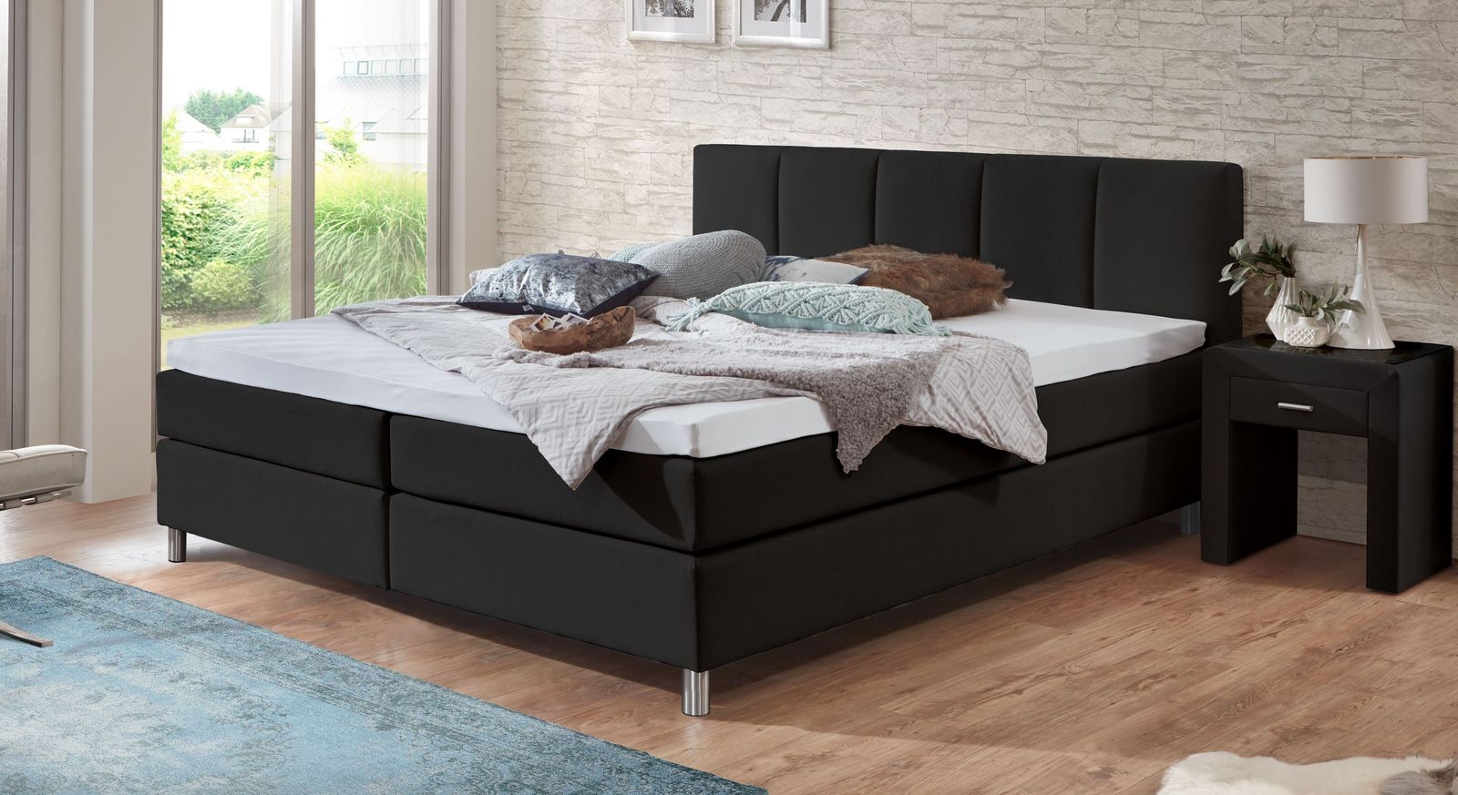 Genie&szlig;en Sie im Boxspringbett "Rockford" (hier in Schwarz, 53 cm hoch) traumhaft erholsame N&auml;chte.