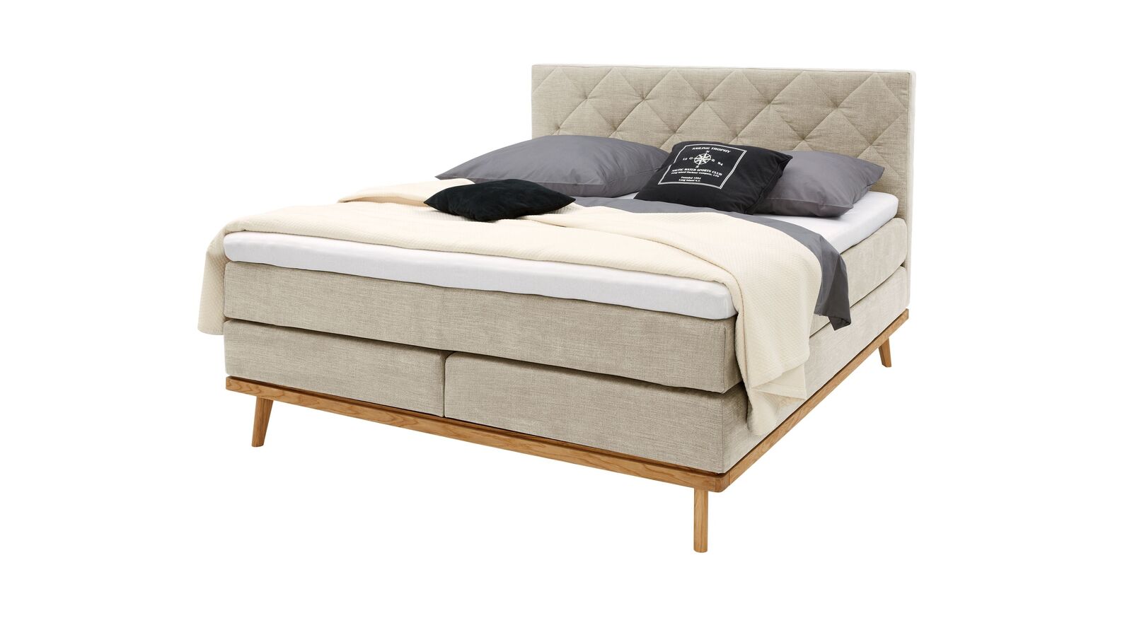 Das MUSTERRING Boxspringbett "Delphi" &ndash; hier in der Stoffart STONE, Farbe: Beige.