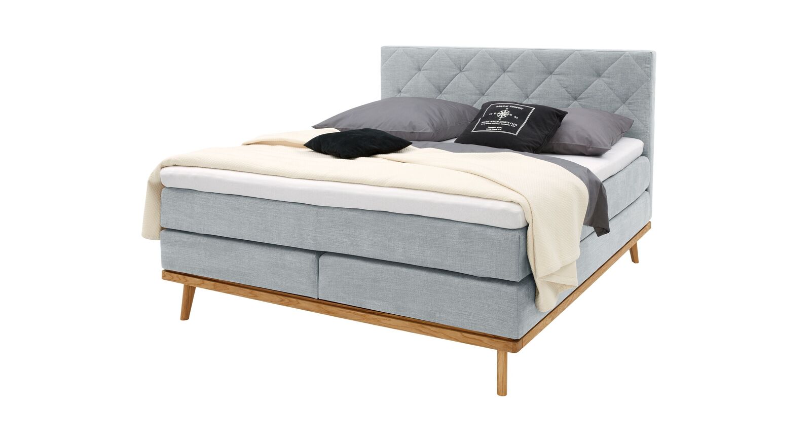Das MUSTERRING Boxspringbett "Delphi" &ndash; hier in der Stoffart STONE, Farbe: Eisblau.